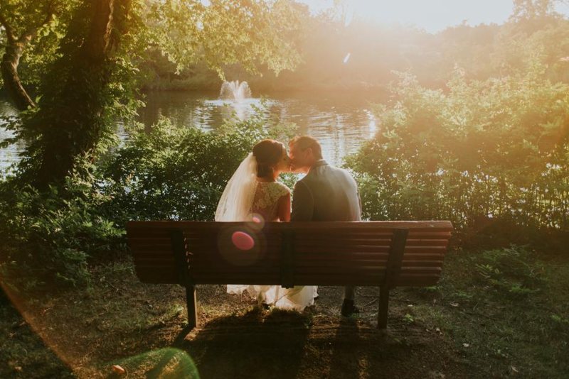 Couple seated on a park bench